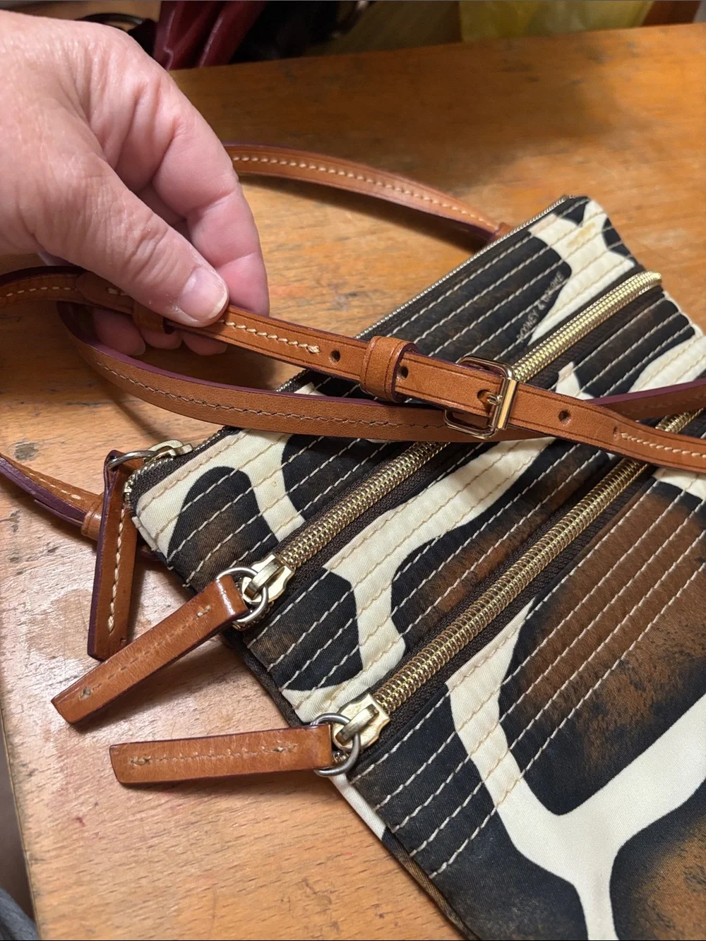 Dooney & Bourke Brown, Black & Cream Giraffe-Pattern Messenger Bag